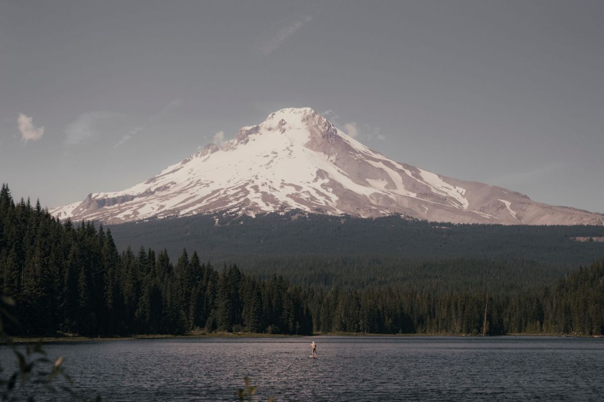 Mount Hood rising over forest and Trillium Lake, Oregon