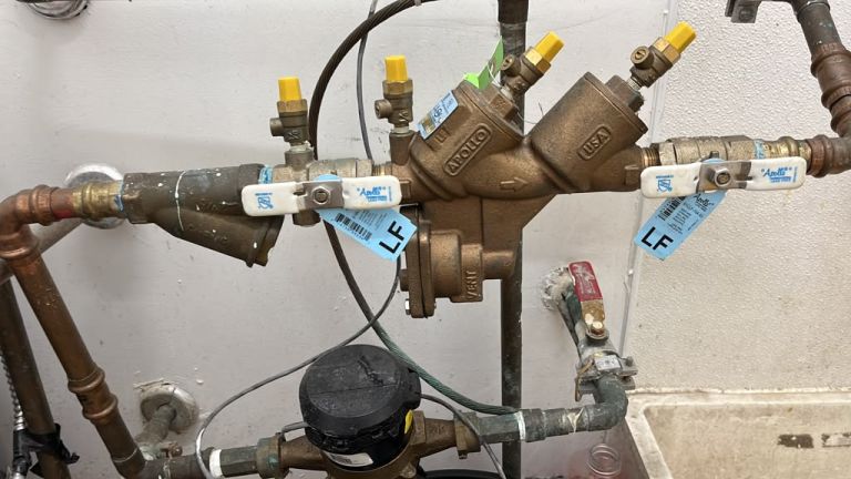 Reduced-pressure backflow assembly with shut-off valves on a copper water line
