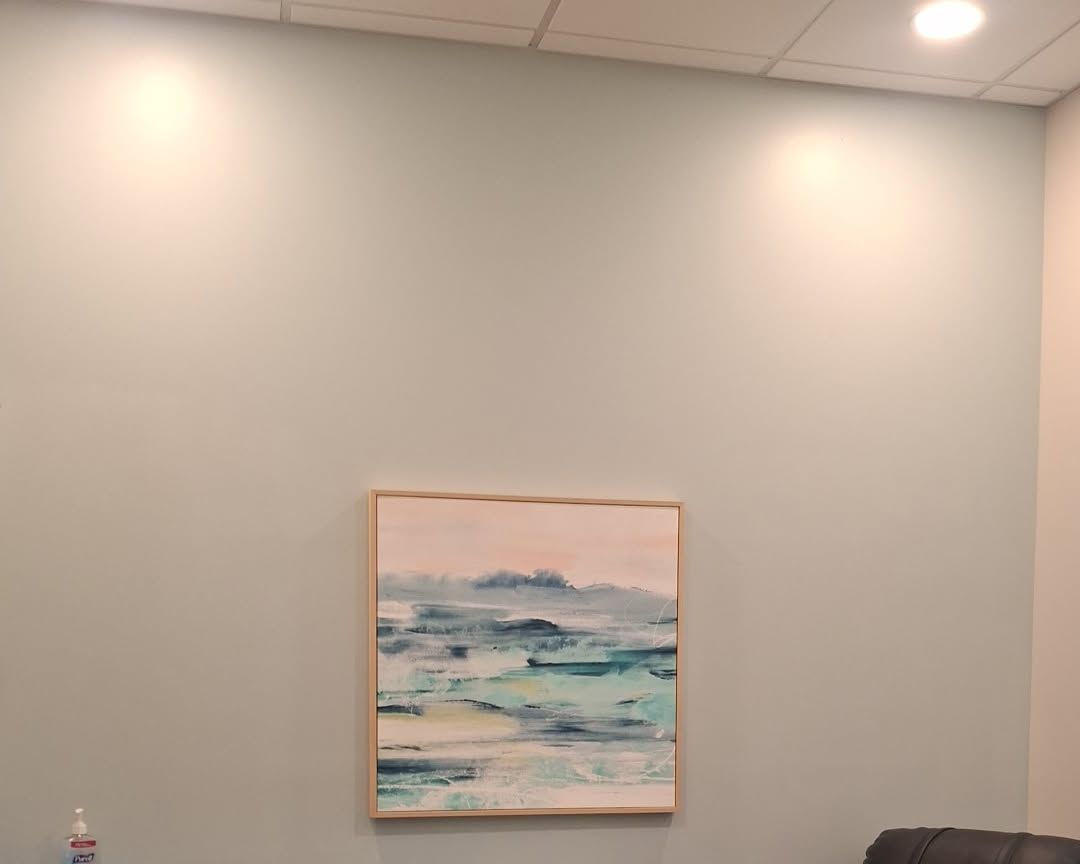 Repainted patient room with artwork on the wall