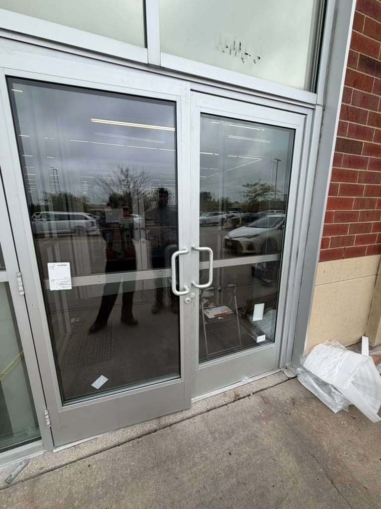 Aluminum and glass entry doors after the repair