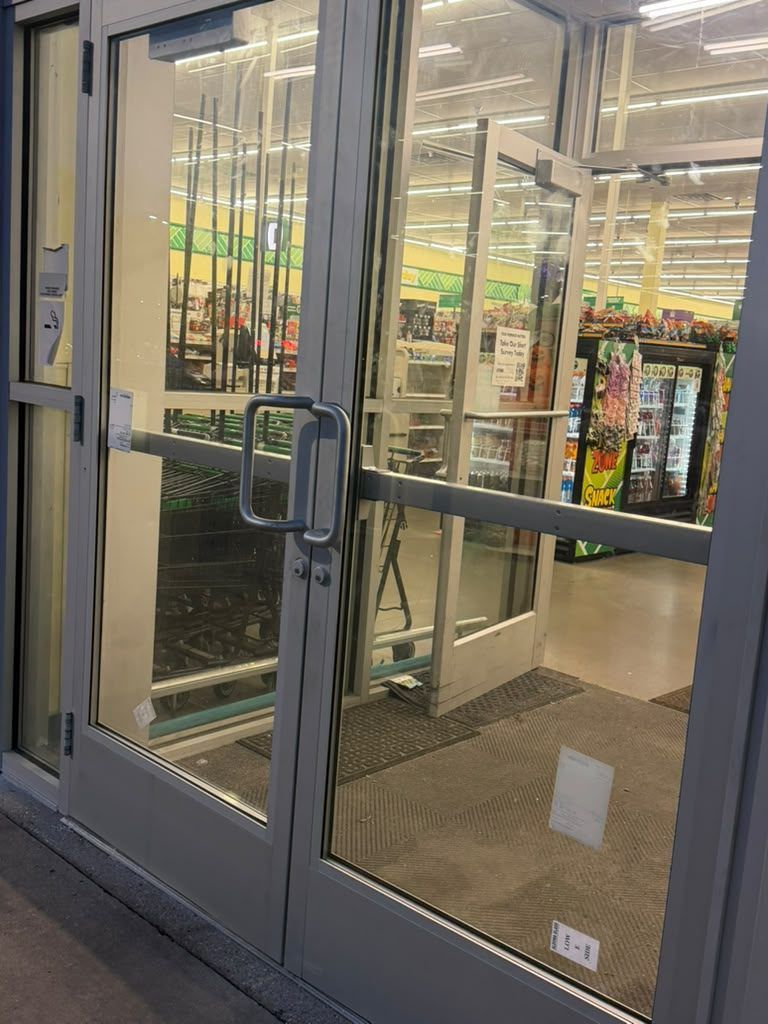 Store entry doors seen from the vestibule