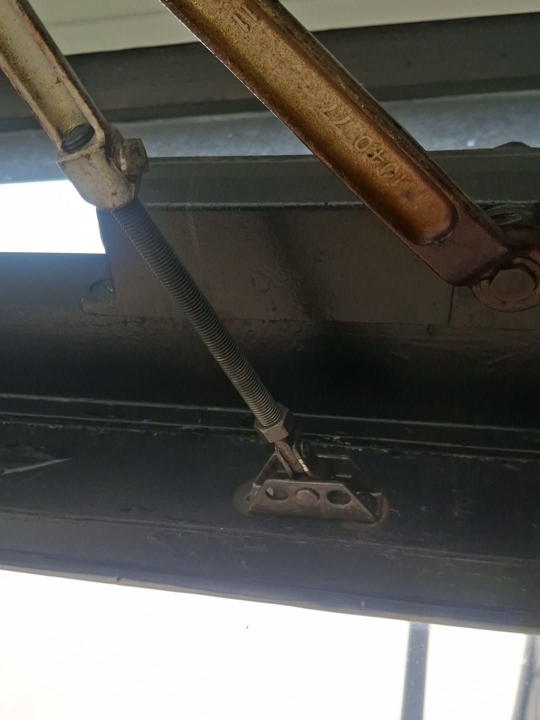 Window arms with new brackets fitted